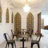 Отель OYO 90221 Makarim Guest House Syariah, фото 3