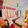 Отель OYO Home 84603 Trinetra Guest House, фото 7