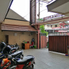 Отель OYO 90703 Wisma Ibu T, фото 13