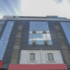 Отель OYO 24093 Kp Suits, фото 1