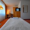 Отель Motel55 - nettes Hotel mit Self Check-In in Villach, Warmbad, фото 17