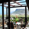 Отель Clovelly Lodge Guest Apartments, фото 3