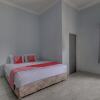 Отель OYO 92806 Penginapan Geby Syariah, фото 7