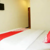 Отель OYO 365 Tya Family Guest House Syariah, фото 17