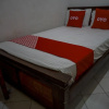 Отель OYO 93069 Penginapan Sumber Rizki, фото 7