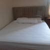 Отель Capital O 93994 Dalem Kamulyan Syariah Guest House, фото 7