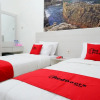 Отель Rich Hotel by RedDoorz, фото 4