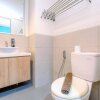 Отель Homey And Simply Look Studio Room At Bogor Icon Apartment, фото 6