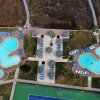 Отель Beachfront Resort * Heated Pool * Sleeps Heaps (Saida Royale 9039) by RedAwning, фото 15