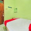 Отель OYO 90031 Villa Papada, фото 26