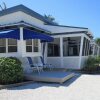 Отель Tropical Winds Beachfront Motel and Cottages, фото 12