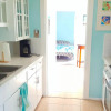 Отель Short walk to beach 3 br 2 bath restored 1935 home, фото 4