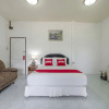 Отель OYO 1165 UMA Apartment, фото 19
