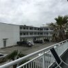 Отель Days Inn Ormond Beach Mainsail Oceanfront в Ормонд-Биче