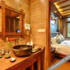 Отель Longzhu Boutique Inn Lijiang, фото 1