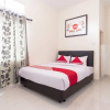 Отель Kamani Homestay Syariah by OYO Rooms, фото 4