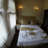 Отель Blue Eye Suites, фото 5