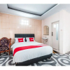 Отель Losmen Guntari by OYO Rooms, фото 6
