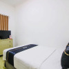 Отель Collection O 91605 Nexdeco House Homestay Syariah, фото 3