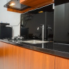 Отель Comfy Studio Room at Patraland Urbano Apartment, фото 17