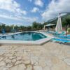 Отель New Hope, studio with pool near the beach, фото 18