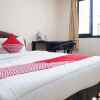 Отель OYO 3445 Delima Guest House Syariah, фото 2