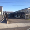 Отель Outpost Motel & Kitchenette Suites, фото 1