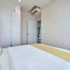 Отель OYO Home 1143 Elegant 2br I-soho I-city, фото 20