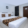 Отель OYO 10611 Hotel Malabar Illam, фото 13