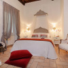 Отель Madonna de’ Monti Suites, фото 2