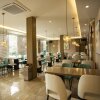 Отель Greentree Inn Mang City Plaza Business Hotel, фото 2