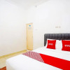 Отель Oyo 91460 Guest House Kencana Syariah, фото 6