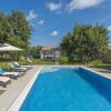 Отель Holiday House with pool, garden, playground and BBQ - surrounded by nature, фото 1