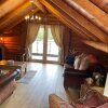 Отель Woodpecker Log Cabin with hot tub, pizza oven bbq entertainment area, lakeside with private fishing , фото 26