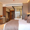 Отель Howard Johnson by Wyndham Bole Plaza Chengwu, фото 3