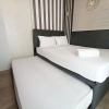 Отель Homey And Cozy Living Studio Amartha View Apartment, фото 10