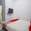 Отель SUPER OYO 91627 Wika Wiki Homestay, фото 15