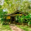 Отель Home Phutoey River Kwai Hotspring & Nature Resort в Сай Йоке