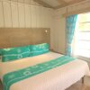 Отель Small Hope Bay Lodge в Барьерном рифе Андрос