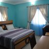 Отель De Royal Legacy Hotel and Suites в Умуахия