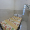 Отель SPOT ON 93035 Karman's Sari Homestay Syariah, фото 8