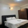 Отель Captivating 3-bed Apartment in Ikeja, фото 7