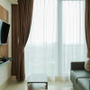 Отель Comfort and Cozy 1BR at Tree Park City BSD Apartment, фото 13