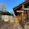 Отель Woodpecker Log Cabin with hot tub, pizza oven bbq entertainment area, lakeside with private fishing , фото 15