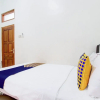 Отель SPOT ON 94007 Homestay Putra Syariah, фото 8