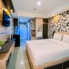 Отель Simple And Cozy Studio Tamansari Skylounge Makassar Apartment, фото 3