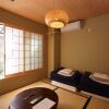 Отель Kyoto Guesthouse Lantern - Hostel в Киото