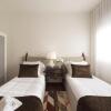 Отель LovelyStay - Newly Decorated 2BR Flat with Free Parking, фото 6