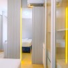 Отель Homey And Modern Look 2Br Transpark Cibubur Apartment, фото 10