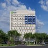 Отель Holiday Inn Express Shanghai Pudong Airport в Шанхае